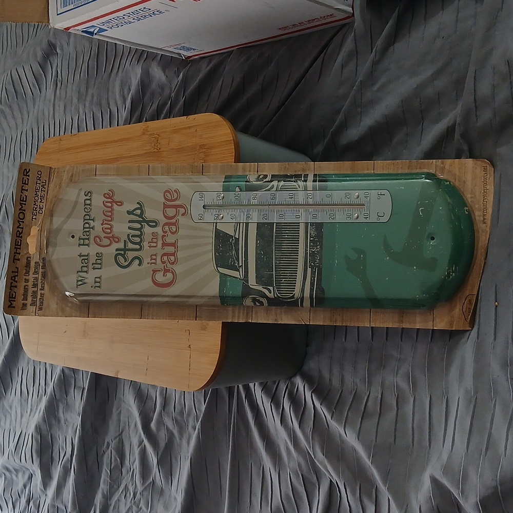 Indoor/outdoorMetal Thermometer "What Happens In The Garage Stays In The Garage"